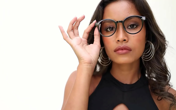 Catch a glimpse of the stunning Putri Cinta, an alluring tanned ebony babe,